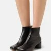 MM6 Maison Margiela Anatomic - Boots À Talons - Black 1 MM6 Maison Margiela Anatomic - Boots À Talons - Black -Aldo Shop 0ff11f698a554e17abc4773769dfd048