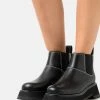 3.1 Phillip Lim Kate Short Lug Sole Combat - Boots À Talons - Black 1 3.1 Phillip Lim Kate Short Lug Sole Combat - Boots À Talons - Black -Aldo Shop e15bc6d611264ac3840e573e3bf5e62d